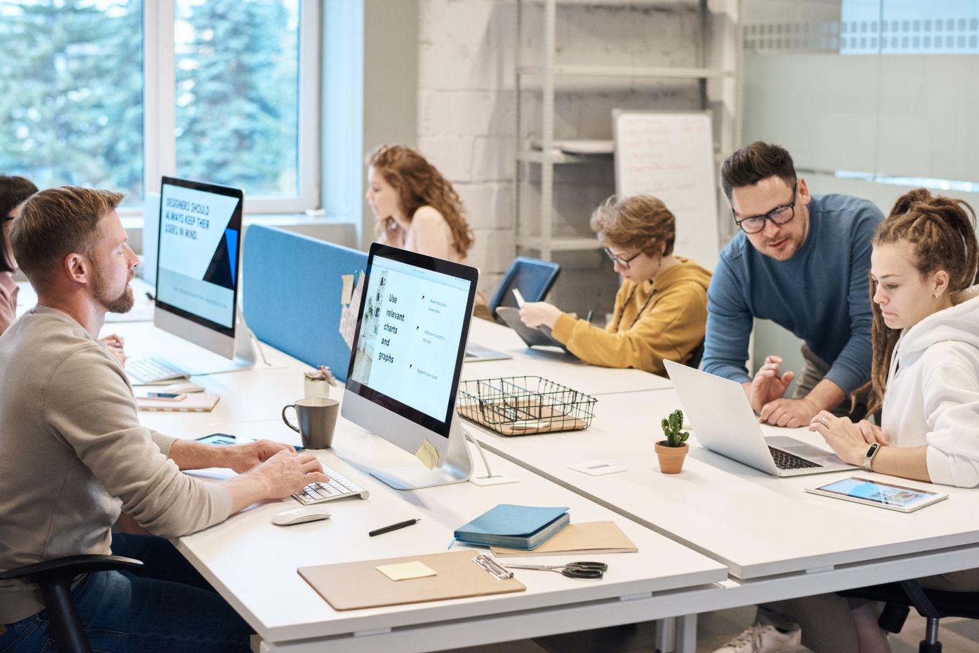 An IT team working at their screens